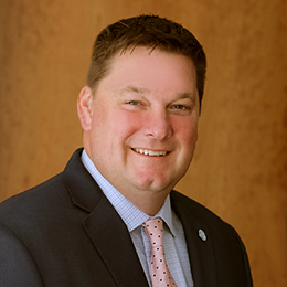 Travis Corkery's headshot